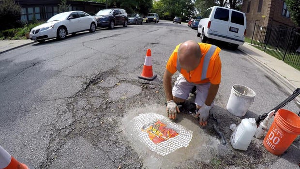 jim-bachor-working-on-pothole-mosaic-b-620.jpg