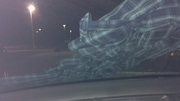 Woman's Post Warning About Shirt Wrapped Around Windshield Goes Viral