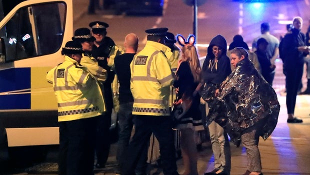 UK PM May says threat level raised to