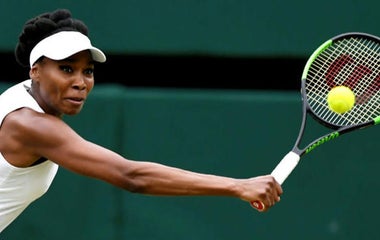 Venus Williams defeated at Wimbledon as Roger Federer heads into final