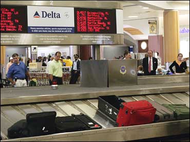 delta extra carry on fee