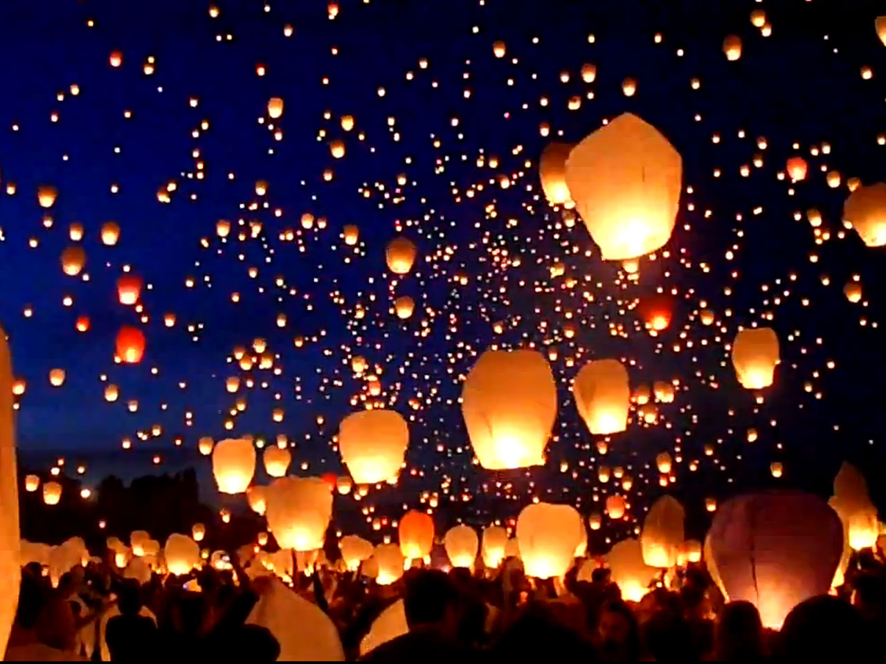 Thousands of lanterns  fill the night  sky in Poland CBS News