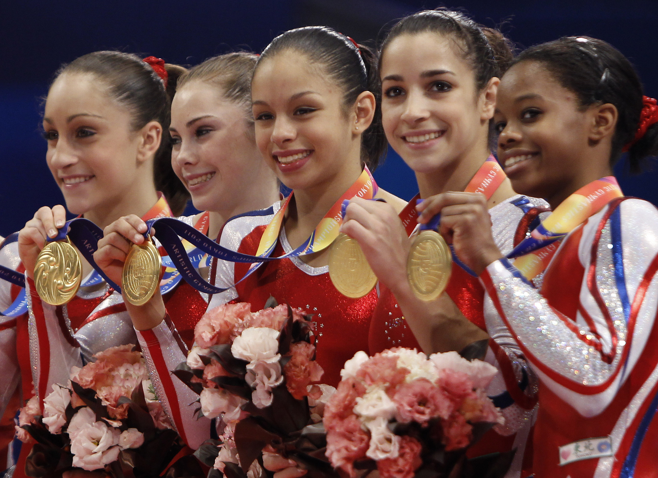 Shorthanded U.S. wins gymnastics gold CBS News