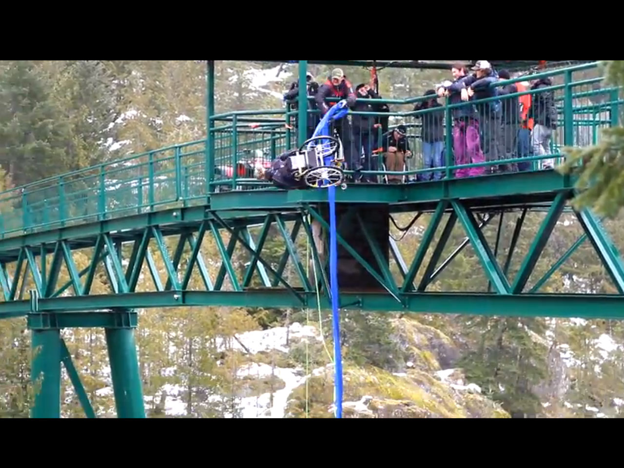 Paraplegic woman Christi Rougoor bungee jumps off bridge in wheelchair