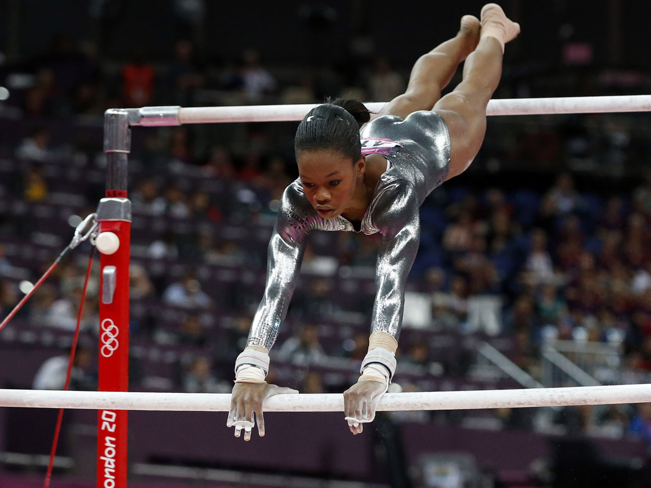 Gabby Douglas "mentally and physically tired" on uneven bars challenge