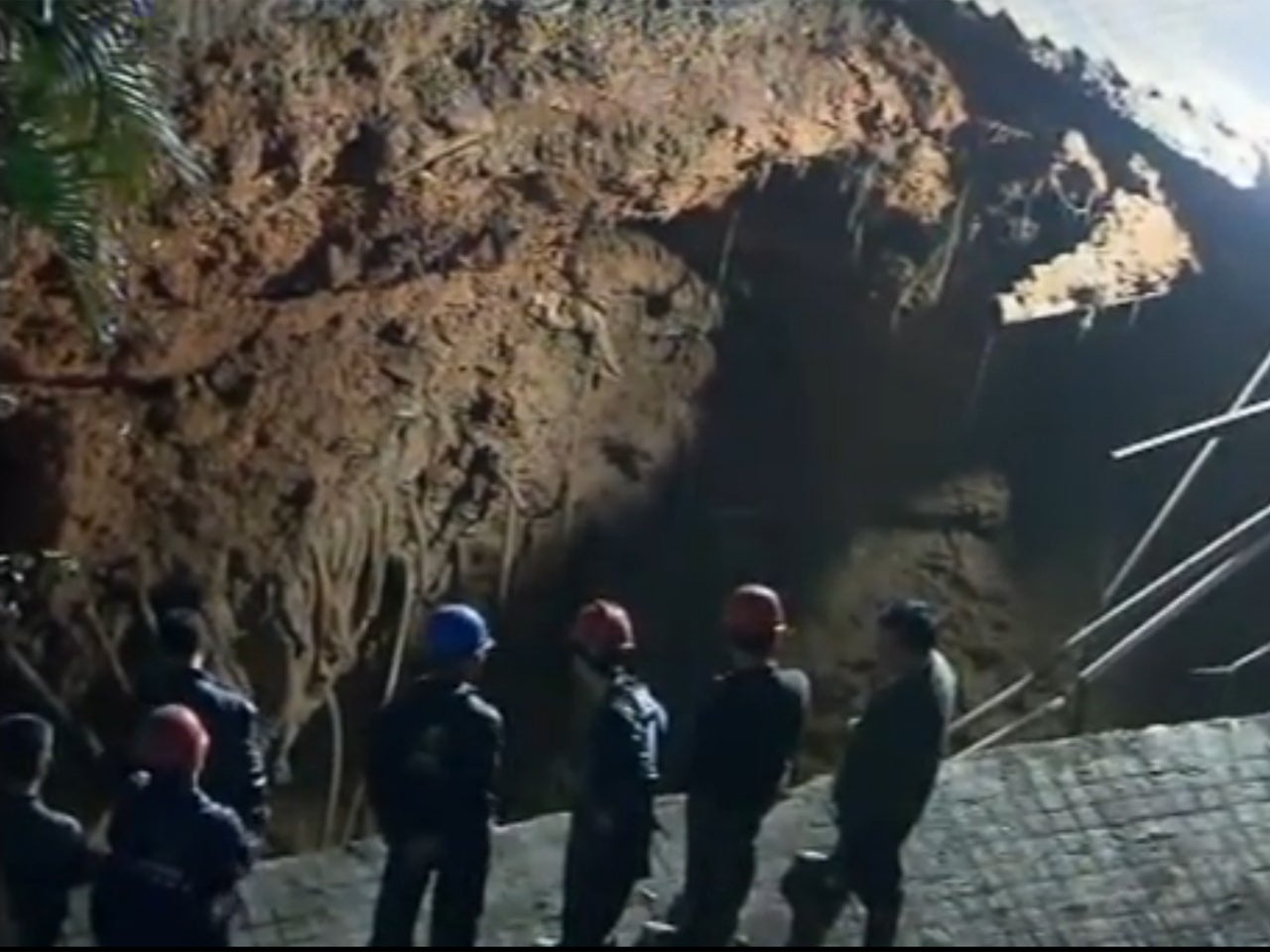 Video captures man falling into sinkhole in China CBS News