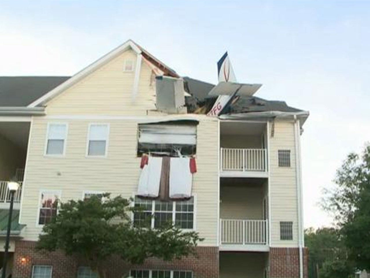 Small plane crashes into Virginia apartment building CBS News