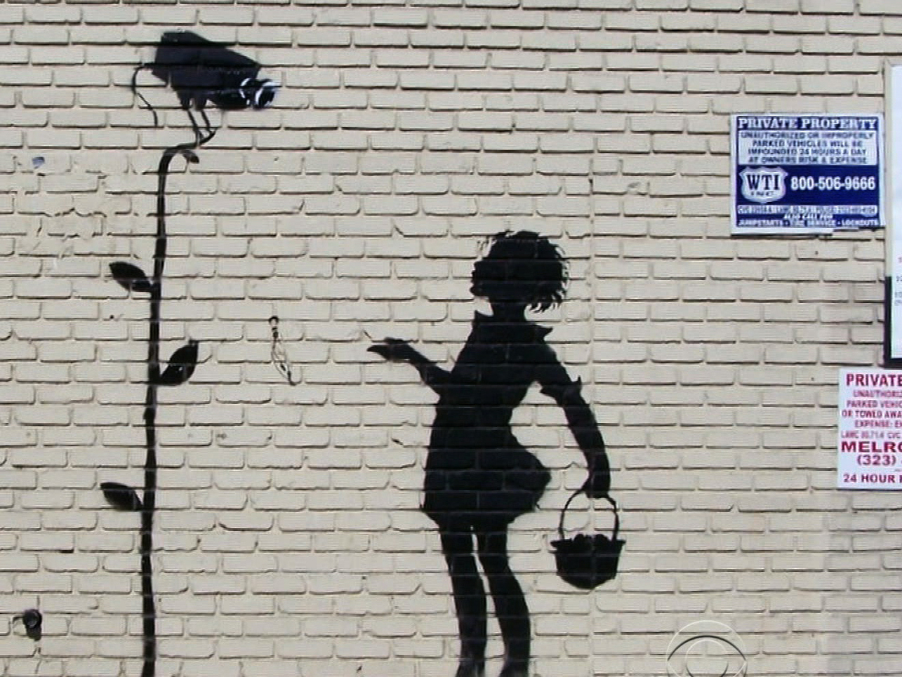 Banksy Mysterious British Street Artist Targets New York City Cbs News