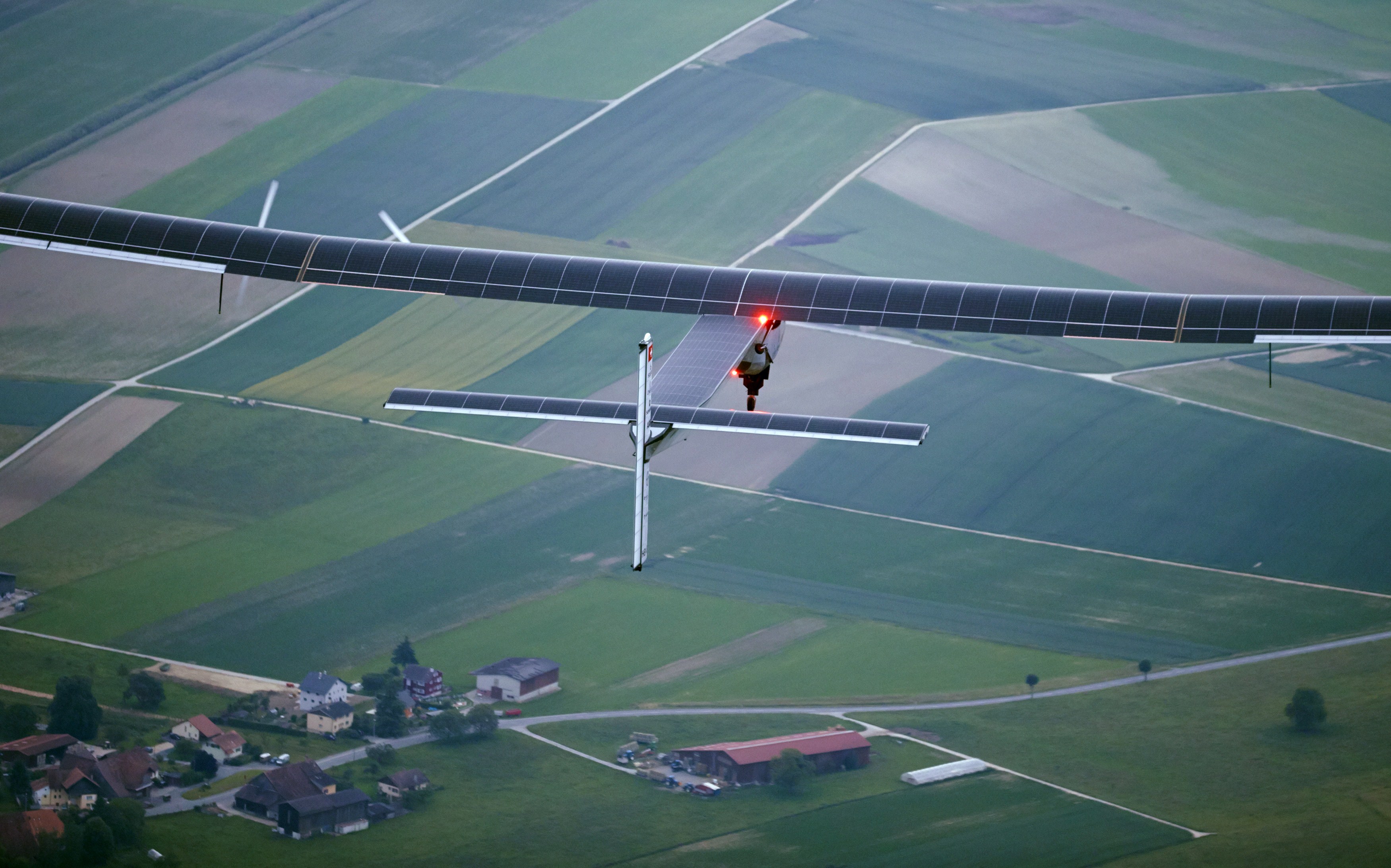 Solar Impulse 2 sun-powered aircraft takes maiden flight - CBS News