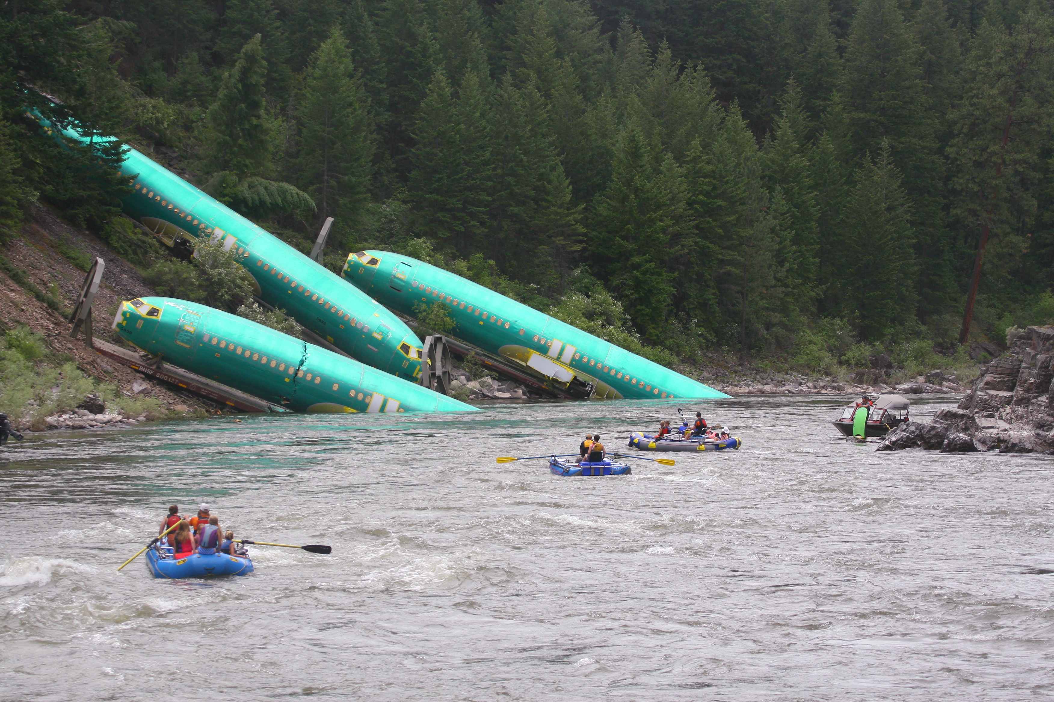 Crews Pulling Plane Fuselages From Montana River After Train Derailment 1648