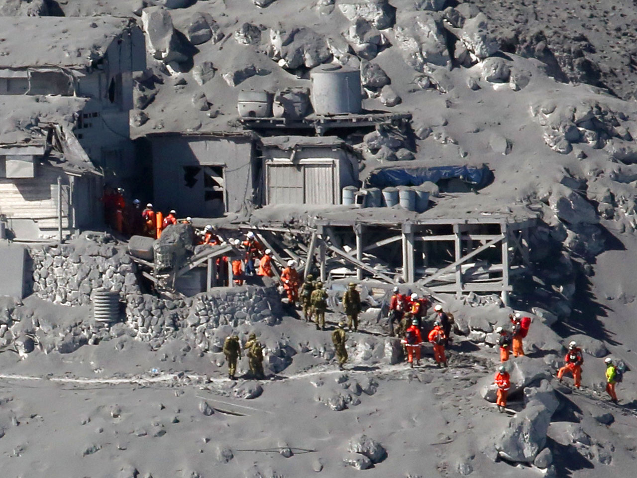 Mount Ontake volcanic eruption in Japan kills at least 31 people