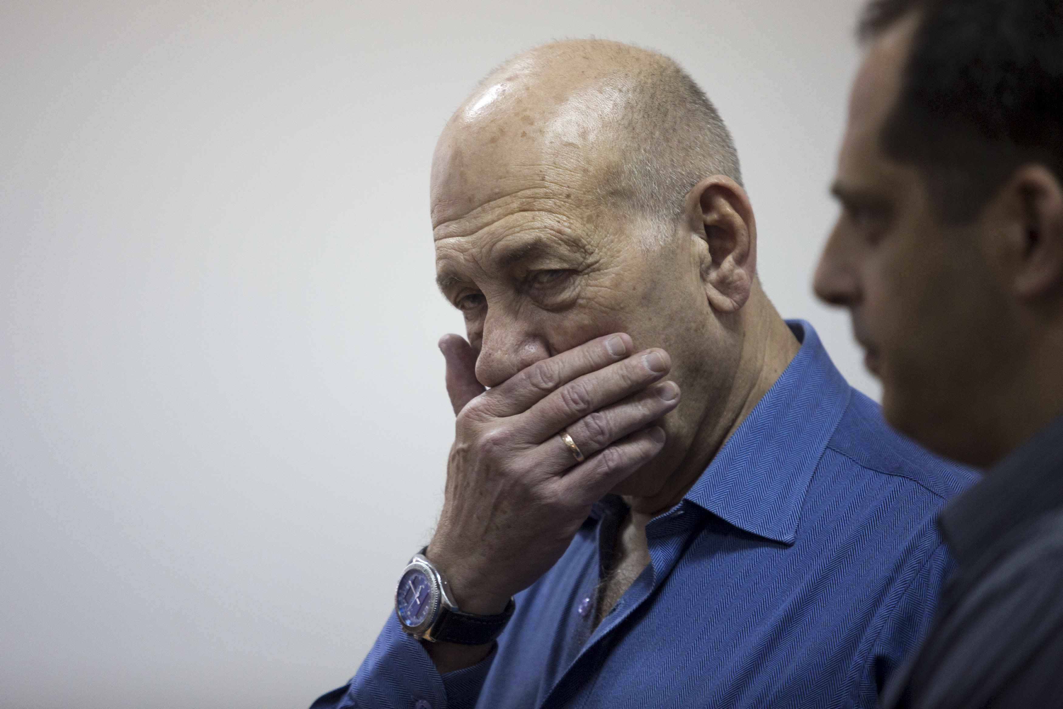 Ex Israel leader Ehud Olmert sentenced to prison in cash stuffed