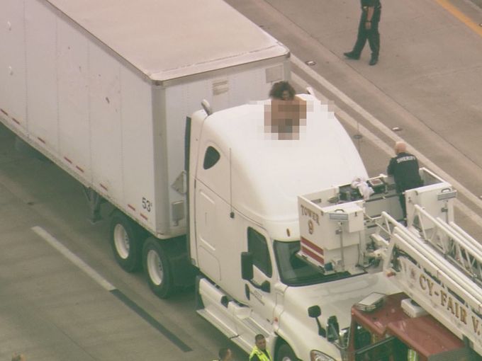 Naked Woman Dances on top of Semi Truck, Shuts Down 