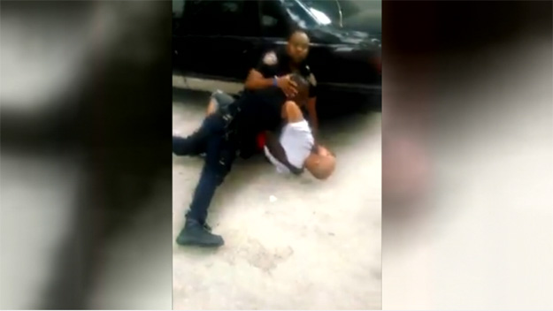 photo police officer curb stomping black man