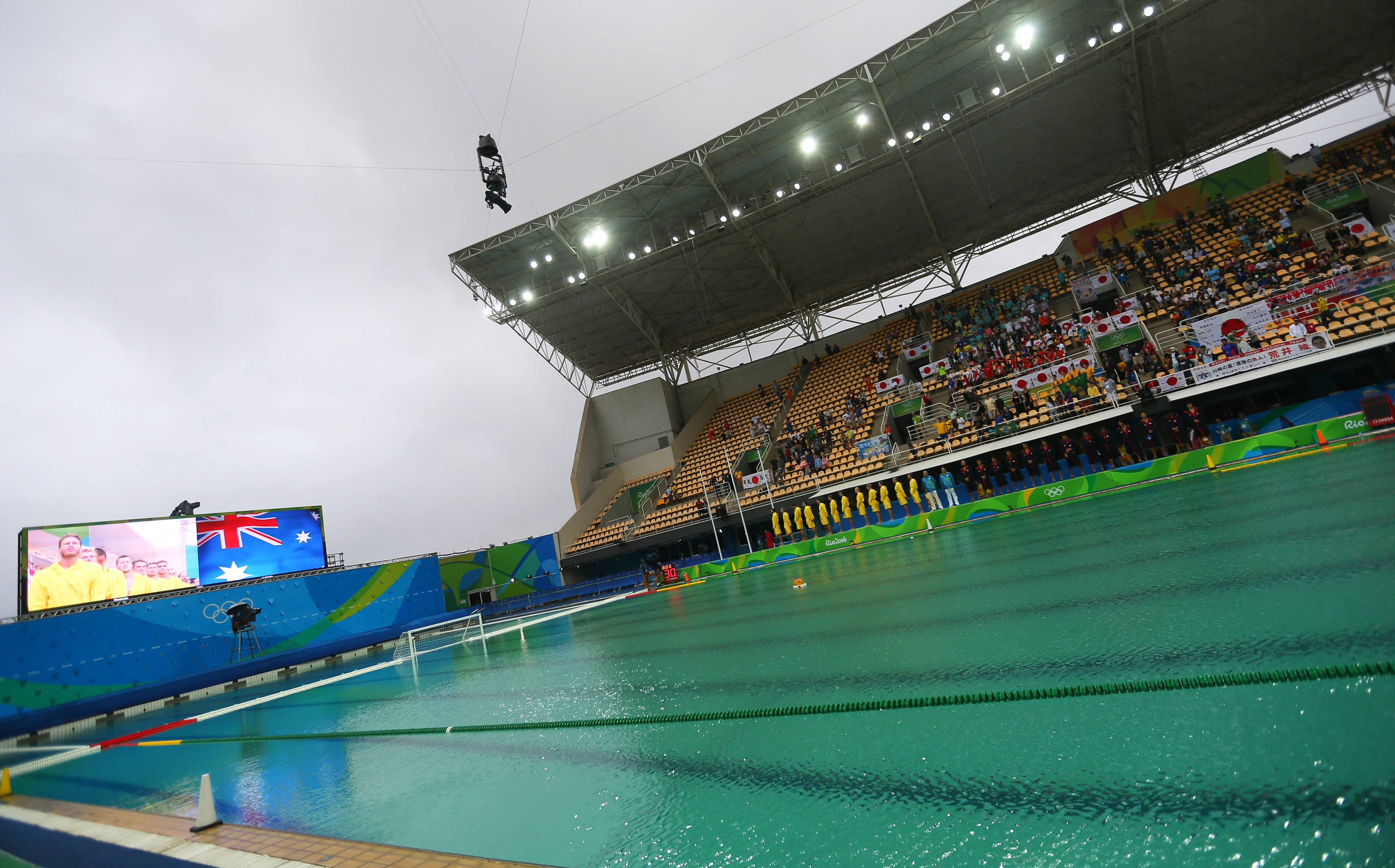 Olympic Officials Wave White Flag In Effort To Clean Green Pool Cbs News