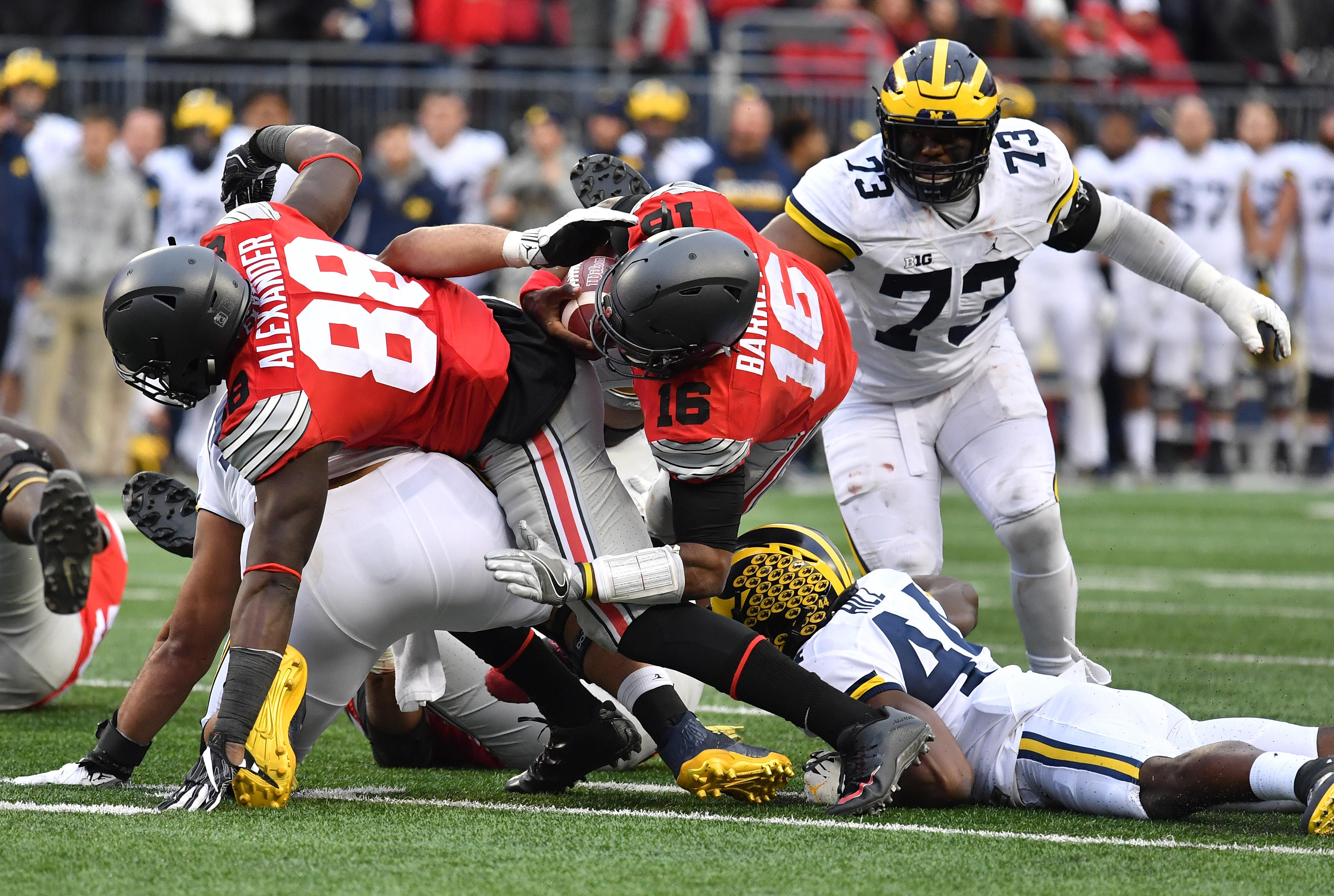 Controversy keeps Ohio State in playoff picture with win over Michigan