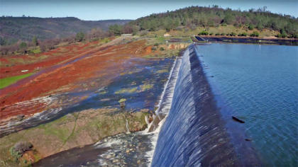 oroville dam spillway emergency water california over released northern lake kicking calif kind mother nature