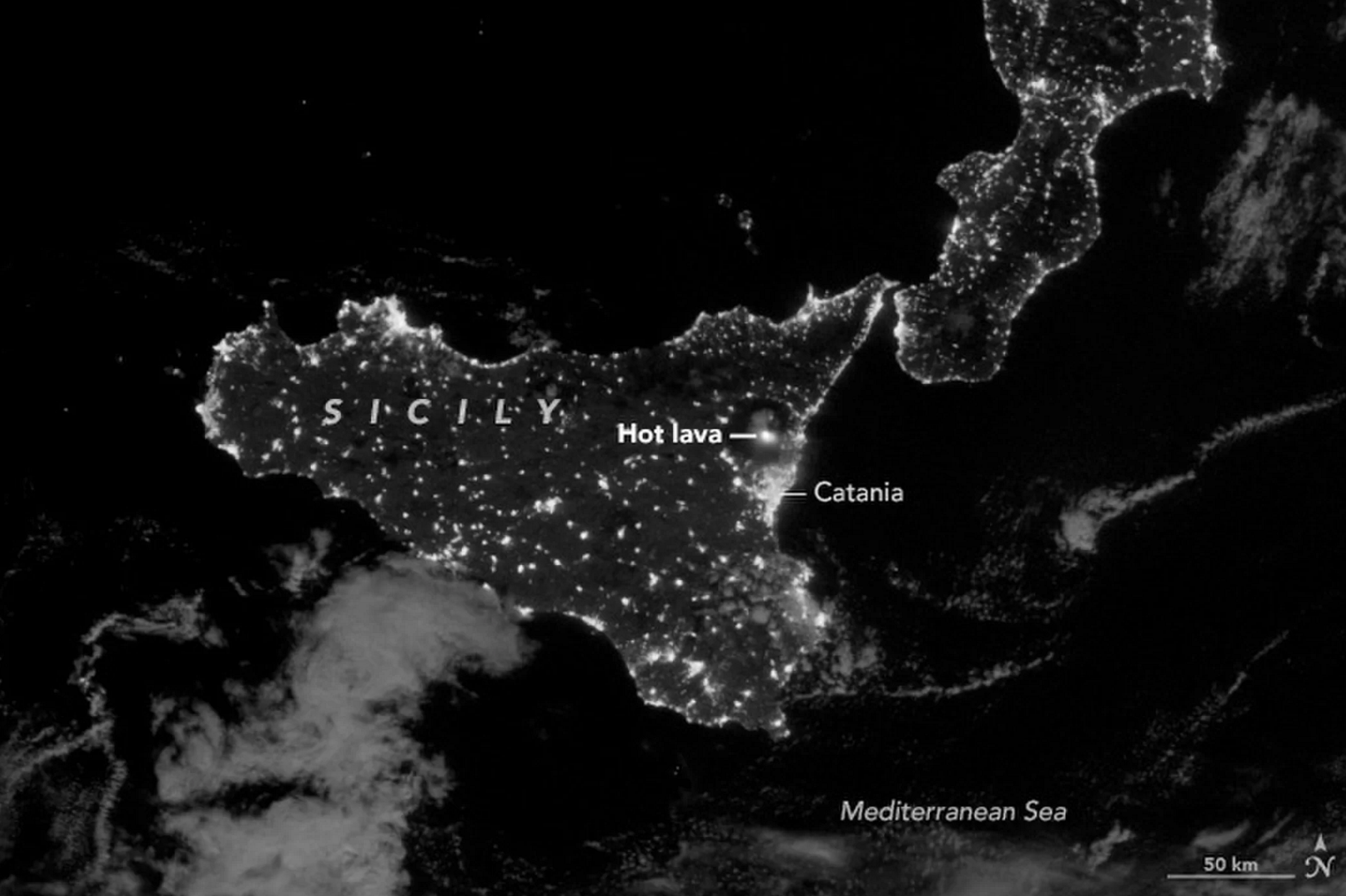 Mount Etna glows hot in new satellite image - CBS News