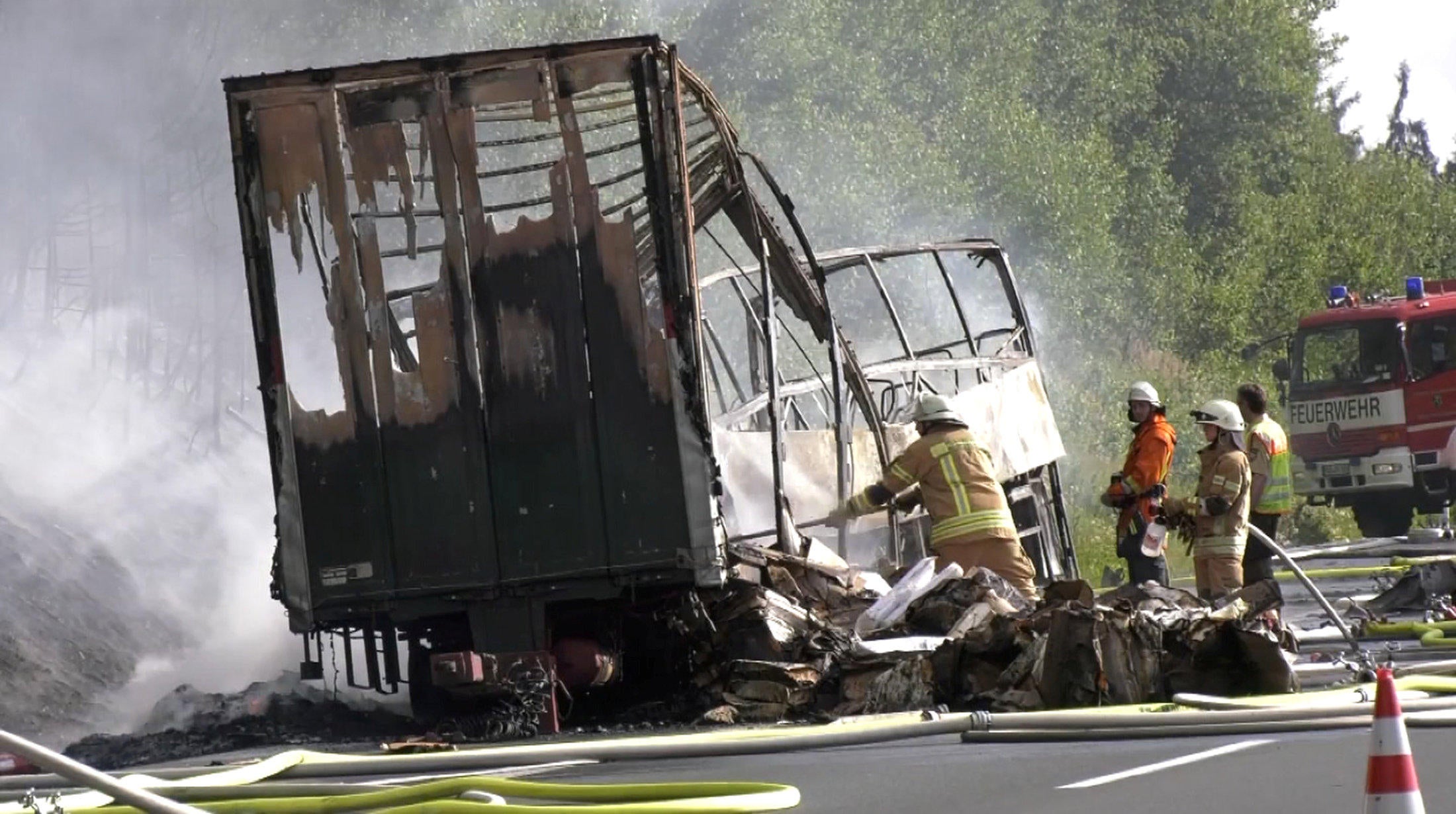 Germany bus crashes into truck causing deadly fire in Bavaria CBS News
