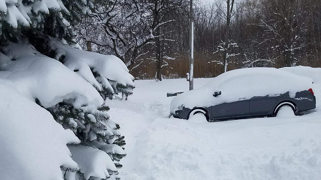 Christmas storm buries Erie, Pennsylvania, with record snowfall - CBS News