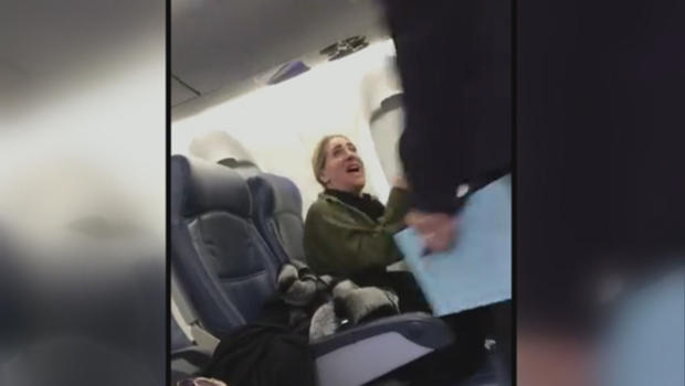 Woman Seen Berating Flight Attendant On Viral Video Now Placed On Leave Cbs News