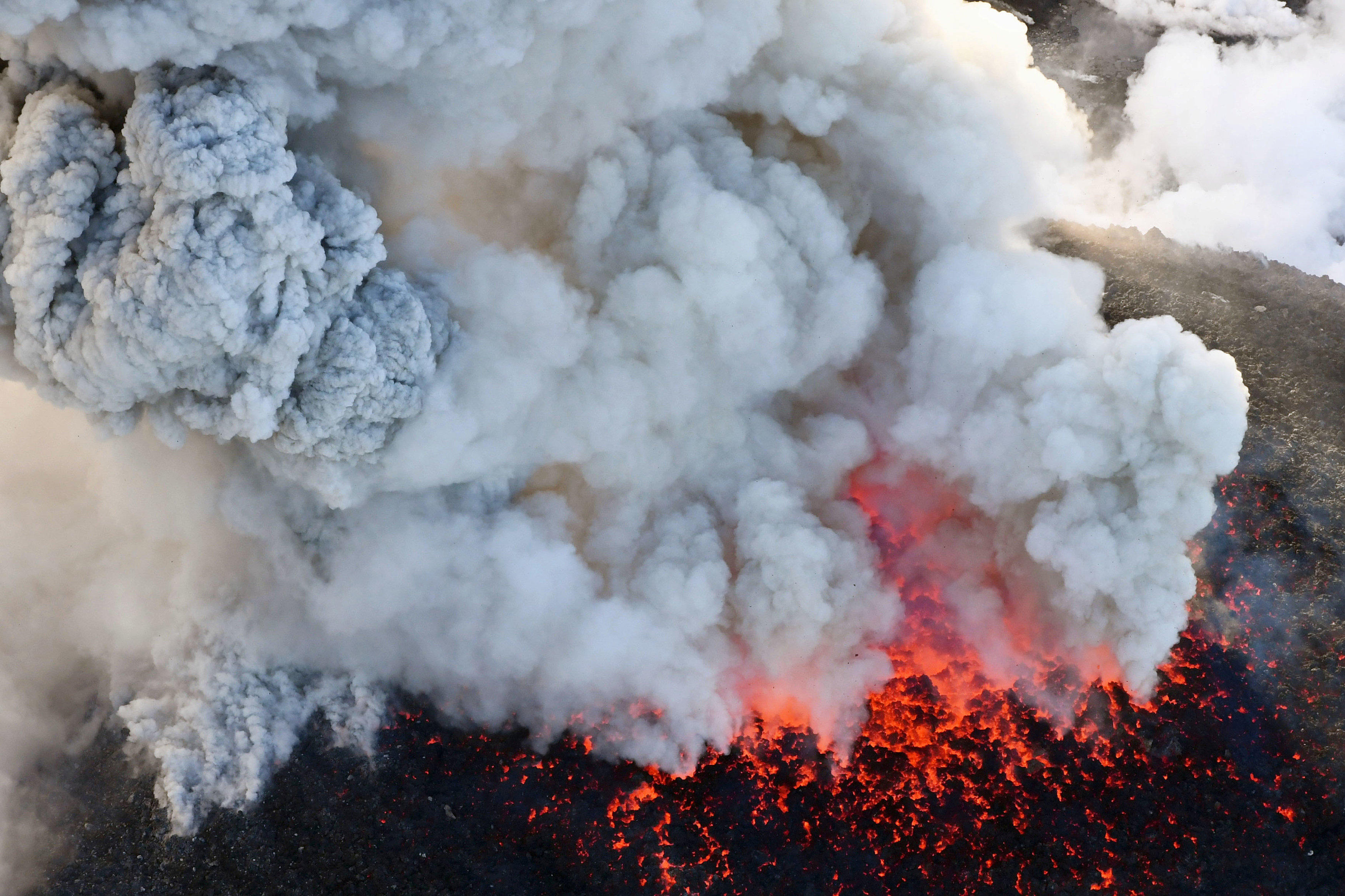 Japan s Shinmoedake volcano  spews ash  lava in strongest 