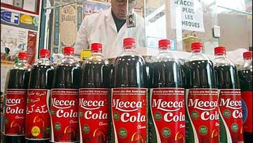 mecca cola Mecca-cola is now sold in some parts of the arab world as well as in certain regions of europe it has also been bought and consumed in certain parts of the united states, britain, india and canada although the product was created in france,. mecca cola Mecca-cola is now sold in some parts of the arab world as well as in certain regions of europe it has also been bought and consumed in certain parts of the united states, britain, india and canada although the product was created in france,.