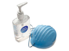 A hand sanitizer and protective mask.