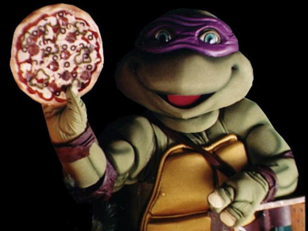 baby ninja turtles eating pizza 1990