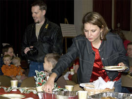 Susan Powell, right, at a church function with her husband Josh Powell, left, Dec. 5, 2009