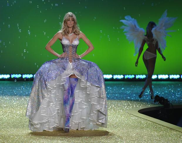Model Candice Swanepoel appears on stage 