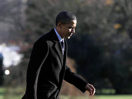 President Barack Obama returns to the White House in Washington