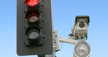 Traffic ticket dismissed on red light camera technicality, report says CBS News
