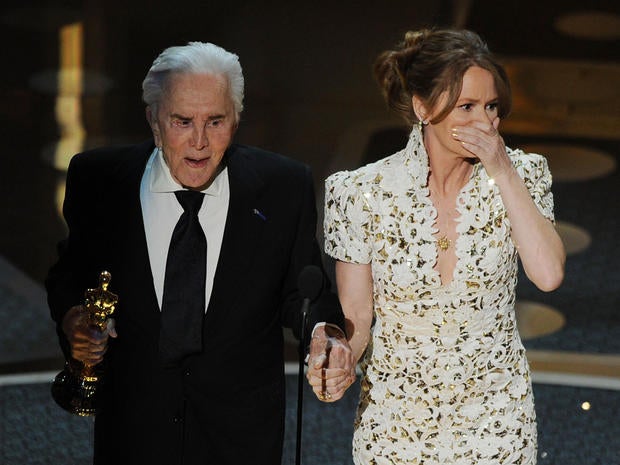 Kirk Douglas with Melissa Leo after Leo won Best Supporting Actress during the 83rd Annual Academy Awards.
