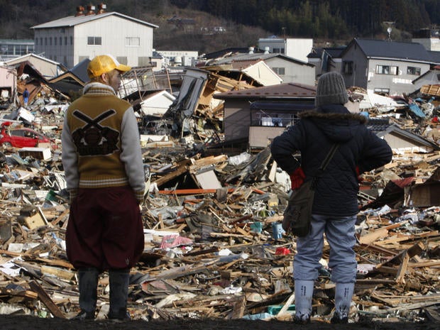 Residents survey tsunami damage in Miyagi Prefecture, Japan