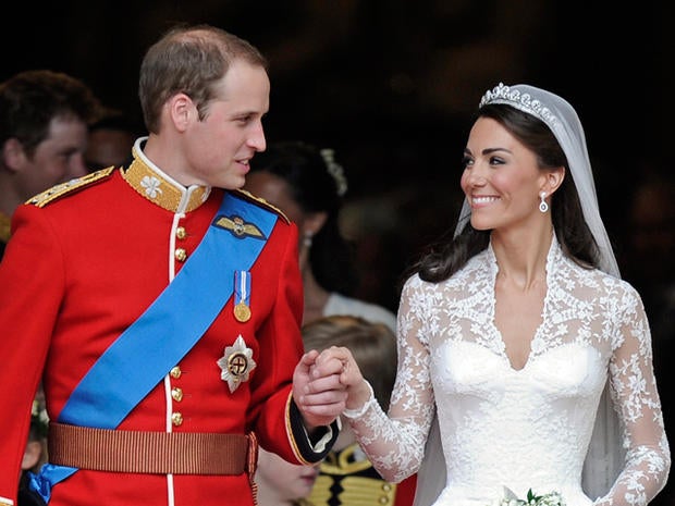Britain's Prince William and his wife Kate, Duchess of Cambridge stand outside of Westminster Abbey
