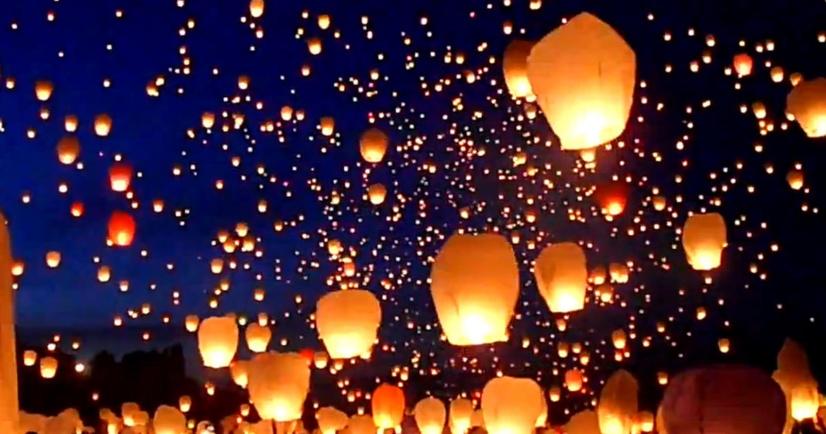 lighting lanterns into the sky