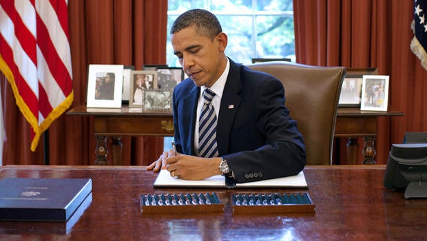 President Barack Obama signs the Budget Control Act