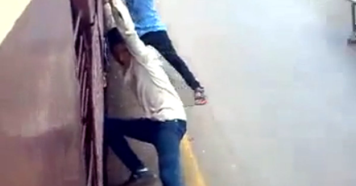 Train surfing in India video shows youths performing dangerous stunt