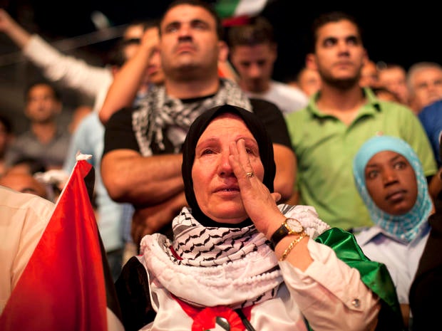A Palestinian woman cries in the West Bank city of Ramallah as President Mahmoud Abbas addressed the General Assembly of the United Nations Sept. 23, 2011.