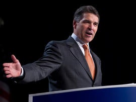Republican presidential hopeful Gov. Rick Perry of Texas gestures during a speech at the Values Voter Summit on Friday, Oct. 7, 2011, in Washington.