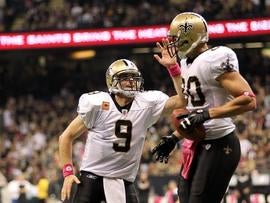 NEW ORLEANS, LA - OCTOBER 23: Jimmy Graham #80 of the New Orleans Saints is congratulated by quarterback Drew Brees #9 after scoring a touchdown during the game against the Indianapolis Colts on October 23, 2011 at Mercedes-Benz Superdome in New Orleans, Louisiana. (Photo by Jamie Squire/Getty Images)
