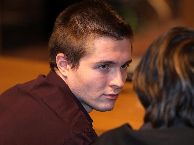 Raffaele Sollecito waits in Perugia's Court of Appeal Oct. 3, 2011, in Perugia, Italy, before hearing that he won his appeal against his murder conviction.
