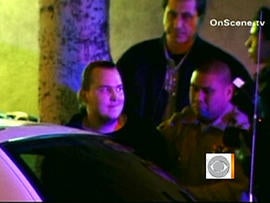 A person of interest was taken into custody for questioning regarding the string of Los Angeles arson attacks, Jan. 2, 2011.