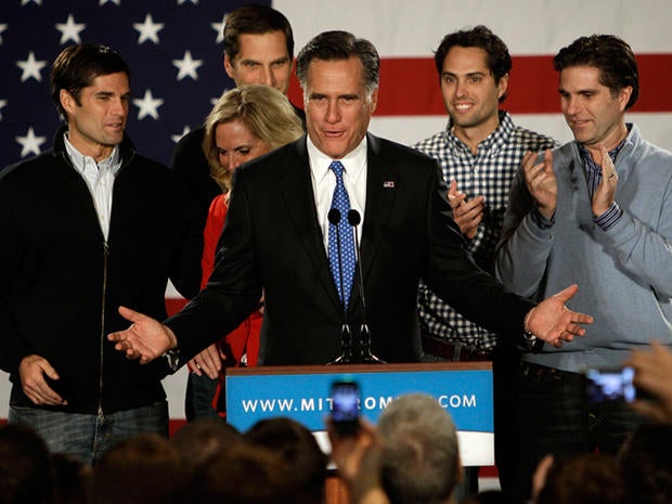 Republican presidential candidate, former Massachusetts Gov. Mitt Romney addresses supports with his family behind him during a Romney for President Iowa Caucus night rally in Des Moines, Iowa, Tuesday, Jan. 3, 2012.