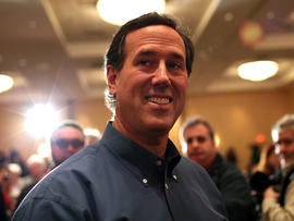 Santorum riding Iowa wave through N.H.