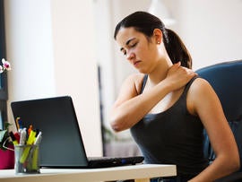 Woman Working With a Sore Back