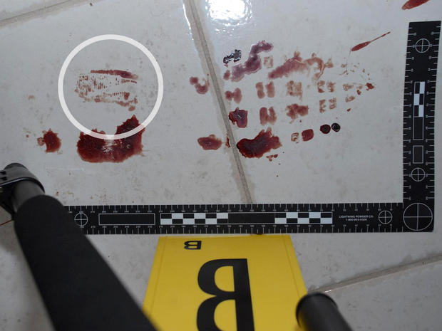 Police searching the Scherer home discover a set of very distinct bloody shoeprints they believe the killer wanted them to find. 