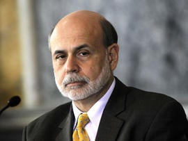 Chairman of Federal Reserve Board Ben Bernanke listens during an open session of a Financial Stability Oversight Council meeting April 3, 2012 at the Treasury Department