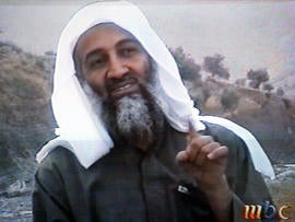 Osama bin Laden gestures in this frame grab from the Saudi-owned television network Middle East Broadcasting Center during the April 17, 2002, broadcast of an undated videotape.